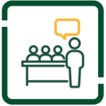 Outline icon of a presenter speaking to three attendees at a table with a speech bubble